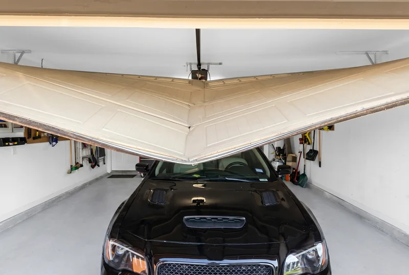 A garage door that has come off its track
