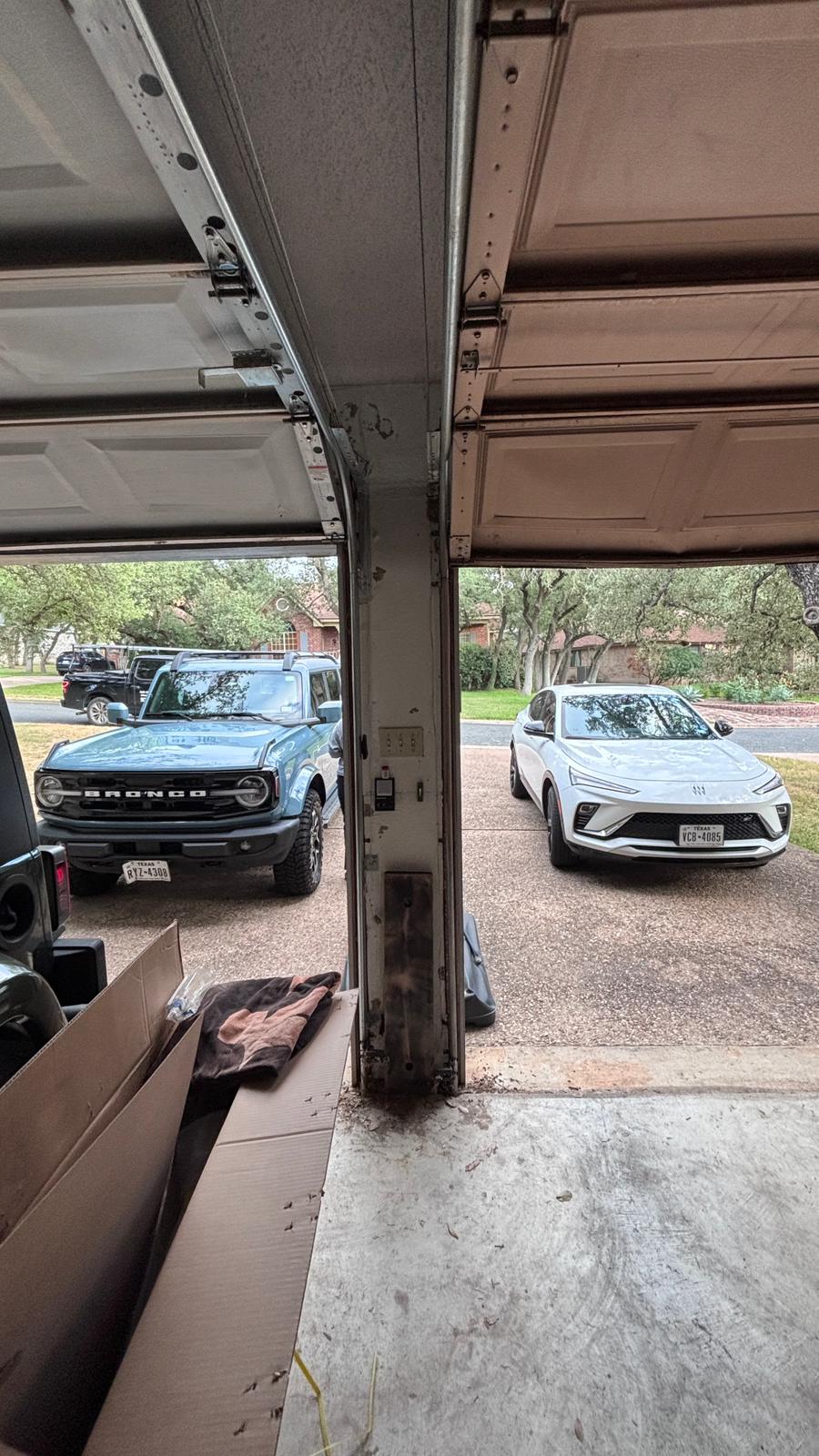 Garage door widening — two single doors to one wide
